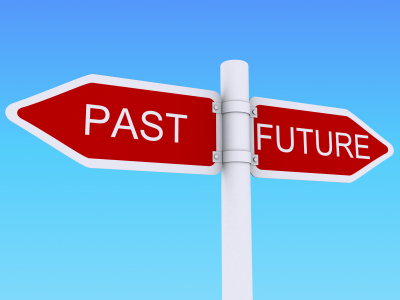 A white signpost with two red directional signs, one pointing left labeled "PAST" and one pointing right labeled "FUTURE," set against a clear blue sky background—an apt metaphor for your career journey.