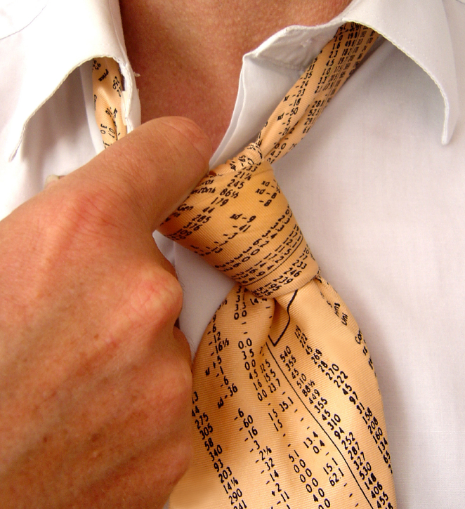 Close-up of a person adjusting a beige necktie with black text resembling computer code or programming script printed on it. The person, who seems to be contemplating "3 Tips for Putting a Pep in your Step in a Ho-Hum Job," is wearing a white collared shirt.