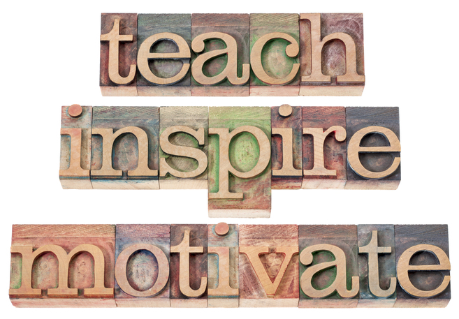 Wooden blocks with colorful, textured letters spell out "teach" on the top row, "inspire" in the middle row, and "motivate" on the bottom row. Each word is aligned horizontally with every block having a distinct hue, symbolizing the essential qualities of mentors.