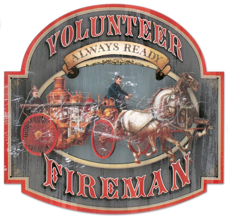 A vintage-style sign reads "Volunteer Fireman - Always Ready" featuring an old-fashioned fire engine with a horse pulling it and a firefighter riding on the engine. The weathered, distressed appearance adds to the nostalgic remembrance, evoking the bravery seen during 9-11.