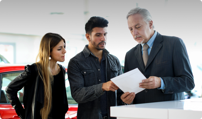 A man asking questions to a businessman to ensure a quality product