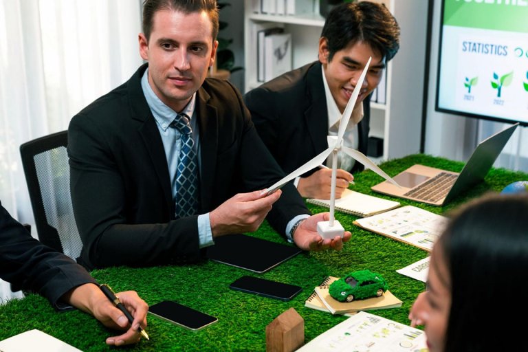Employees in a table discussing the importance of wind engine